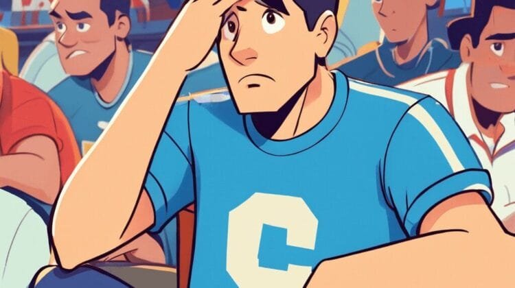 An animated character in a blue shirt with a white "C" appears concerned, holding one hand to his forehead. He sits among a crowded audience, who are also focused on an unseen event, perhaps pondering aspects of sports psychology.
